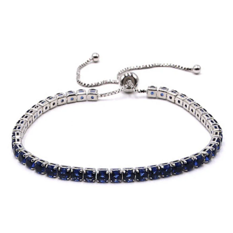 ladies-bangle-stack-diamond-bracelets-Sapphire Blue CZ Tennis Bracelet In Silver