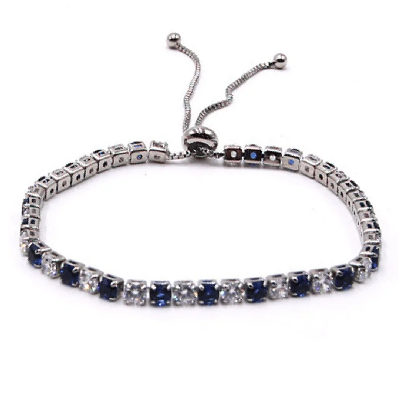 ladies-custom-gold-bracelets-Sapphire Blue & Clear CZ Tennis Bracelet In Silver