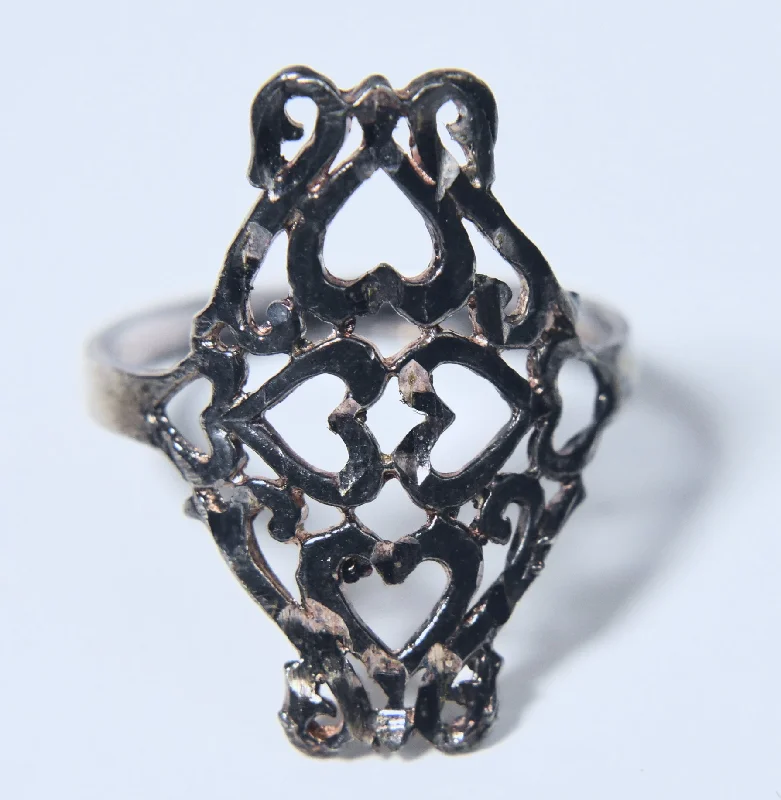 Ladies rings for quest vibes -Sterling Silver Pierced Hearts Design Ring - Size 7