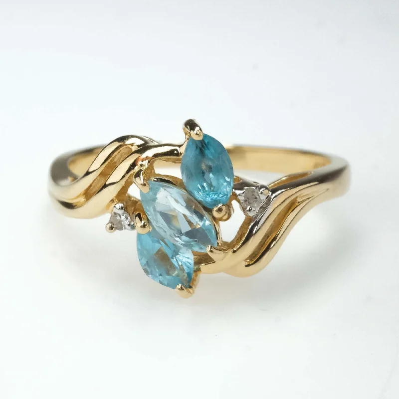 Ladies rings with star designs -0.57ctw Blue Topaz with Diamond Accents Gemstone Ring in 14K Yellow Gold