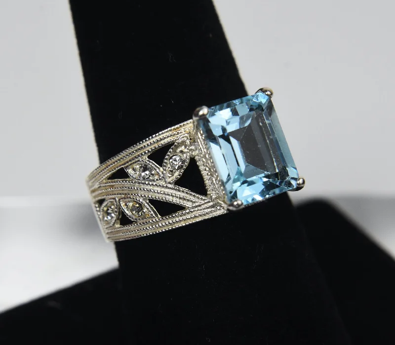 Ladies rings stylish shine -Sterling Silver Light Blue Emerald Cut Ring - Size 7.75