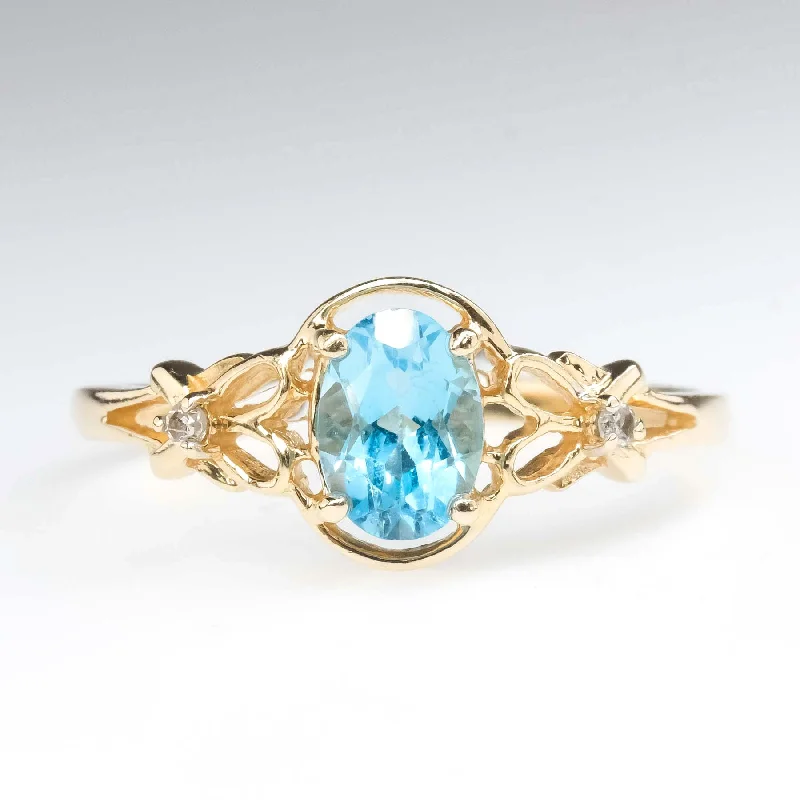 0.94ct Swiss Blue Topaz with Diamond Accents Gemstone Ring in 14K Yellow Gold